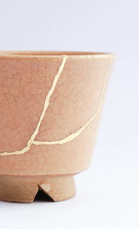 Kintsugi broken bowl mended with gold