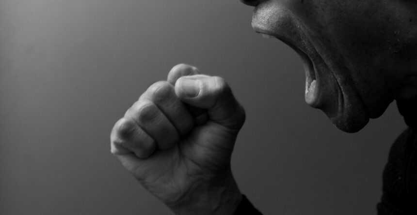 Man,Shouting,With,Anger,On,Grey,Background,With,People,Stock Man,Shouting,With,Anger,On,Grey,Background,With,People,Stock