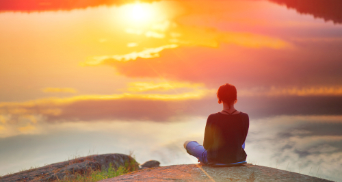 Beautiful,Woman,Sits,In,A,Pose,Of,A,Lotus,On